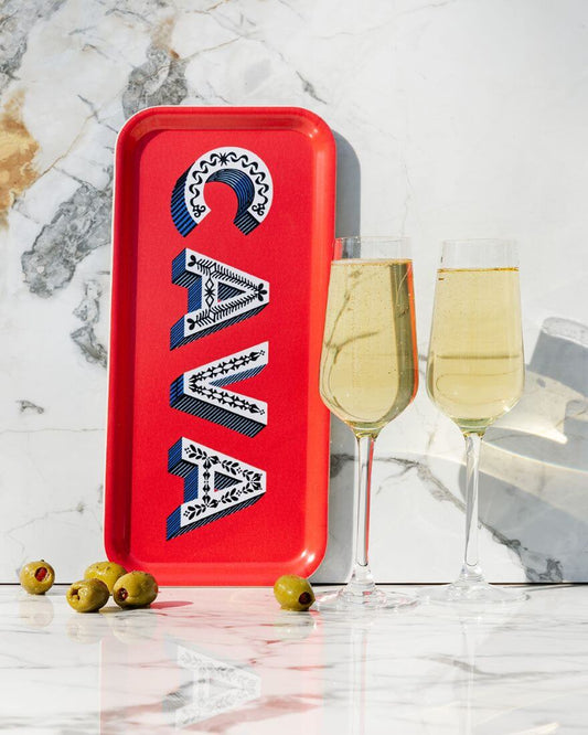Asta Barrington Red "CAVA" Rectangular 32x15cm Tray with flutes and olives on a marble surface.