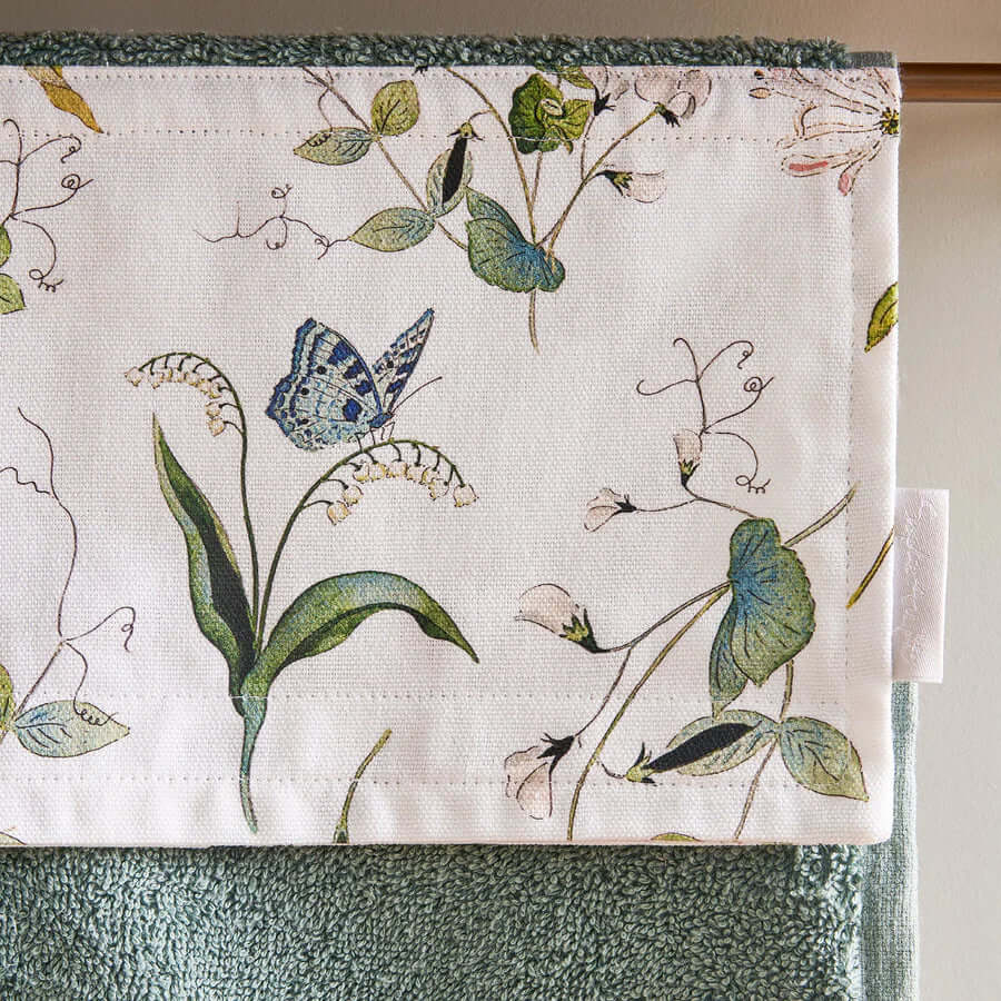 Sophie Allport 'Wild Floral' roller hand towel with butterfly and floral design, pale green towel with decorative fabric panel.