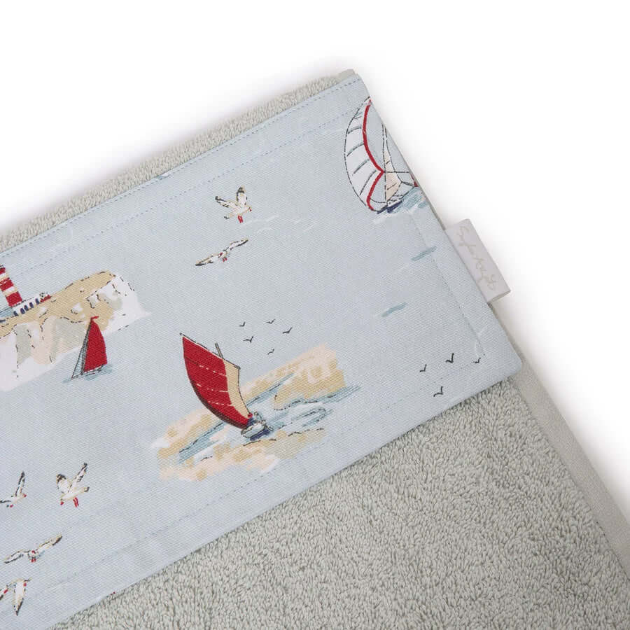 Sophie Allport "Coastal Boats" Roller Hand Towel featuring nautical designs of boats and sea birds on a pale grey towel.