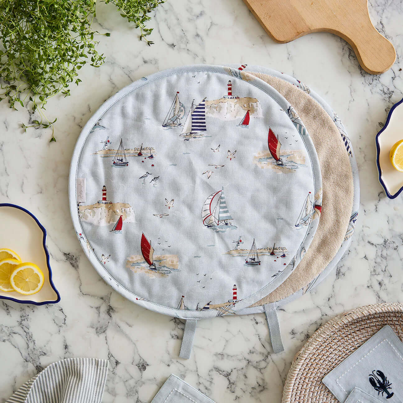 Sophie Allport "Coastal Boats" Chefs Pad For Use With Aga Range Cookers showcasing nautical patterns on soft grey blue fabric.